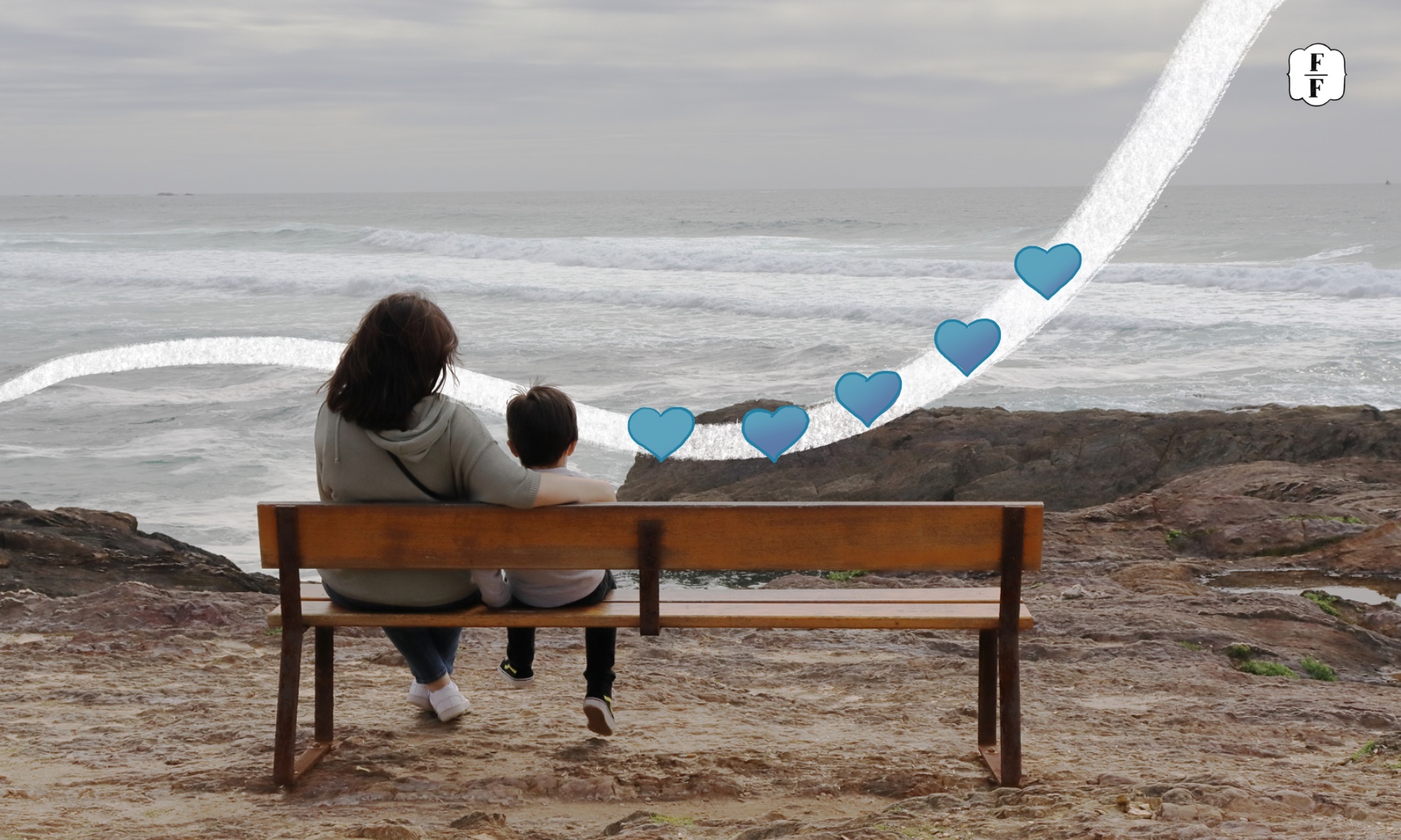 maman et son enfant sur un banc face à la mer